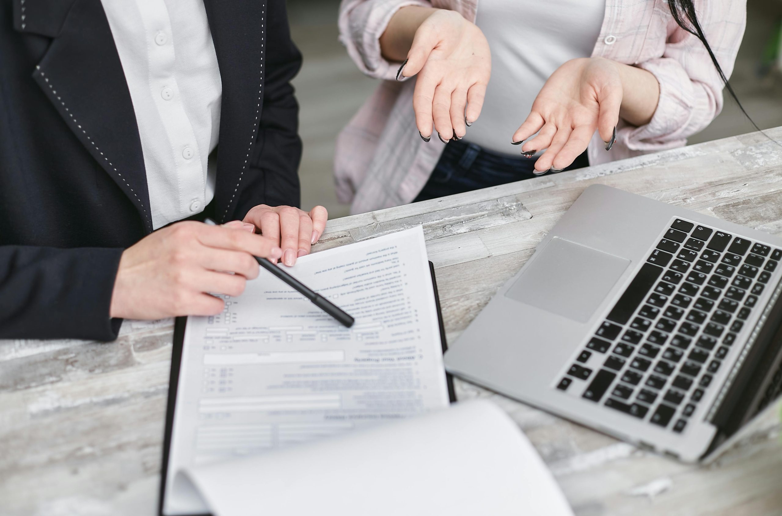 Completing insurance claim form. Typing on keyboard